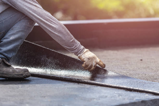 Professional Waterproofing technician working in Watertown, WI